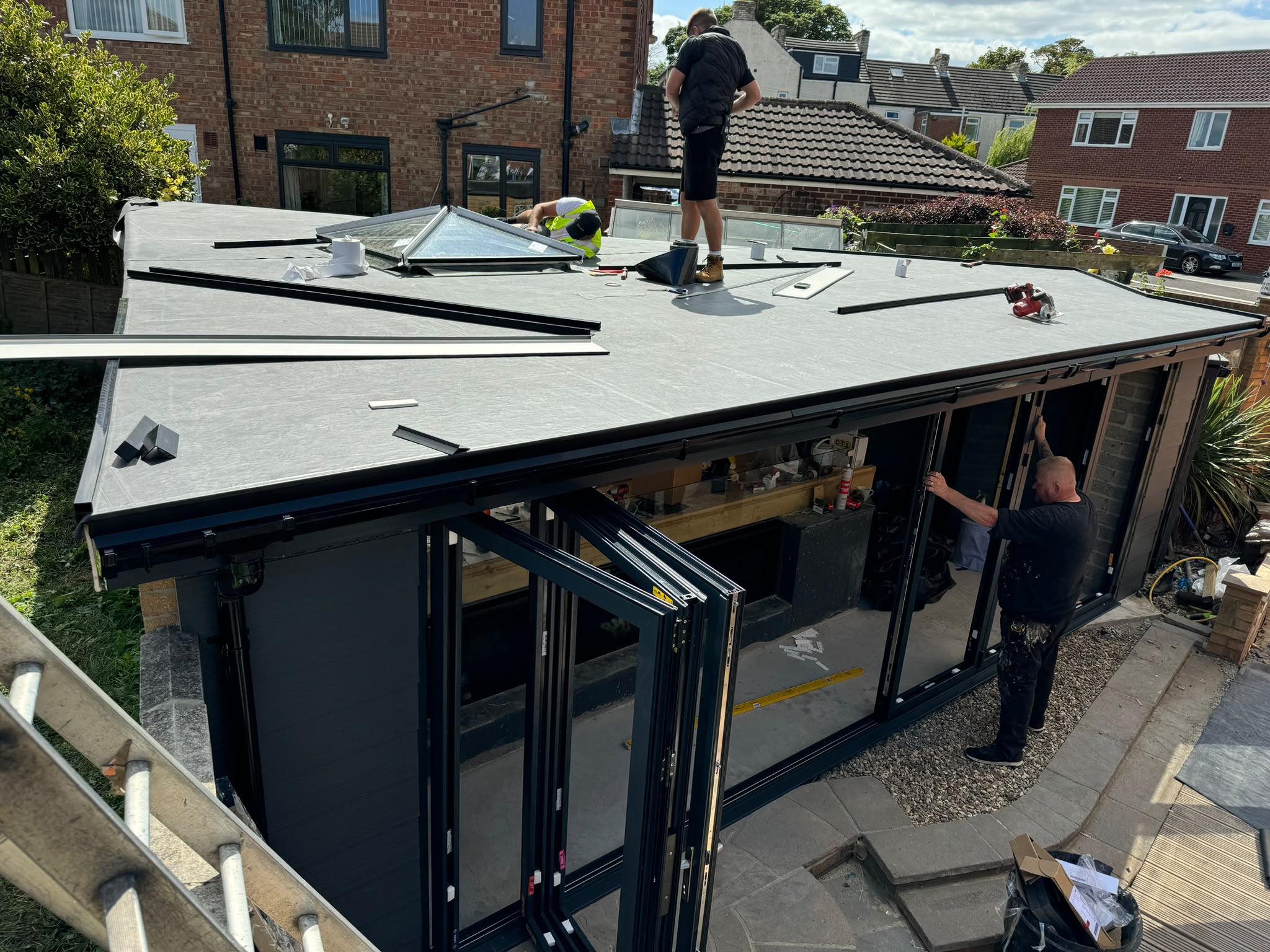 EPDM rubber flat roof with a glass lantern rooflight