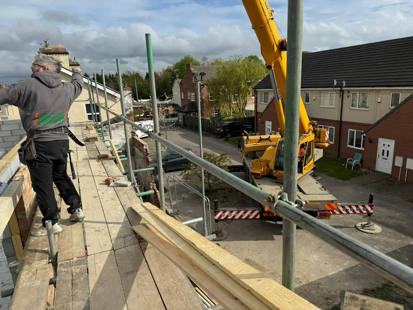 Roofing North East roofers laying a new slate roof on a build in the North East