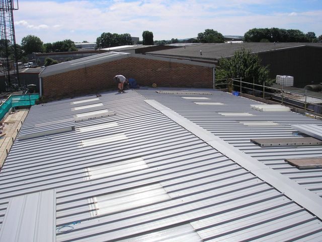 A standing seam metal commercial roof
