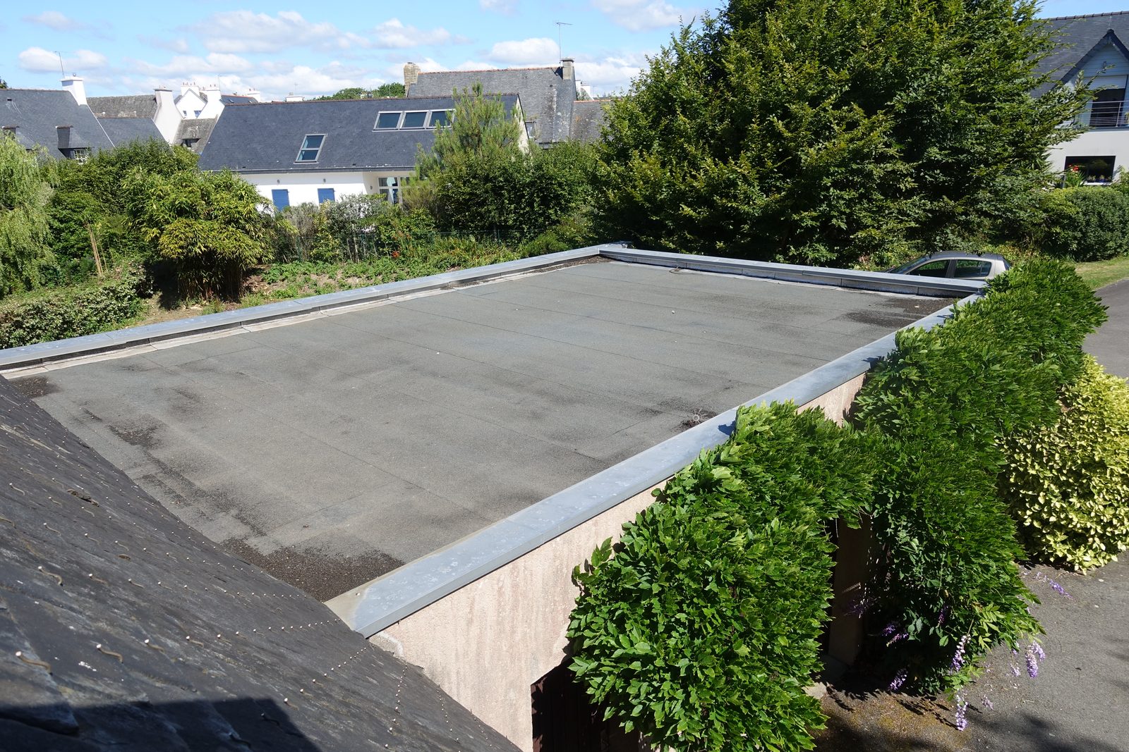 A finished felt flat roof on a garage